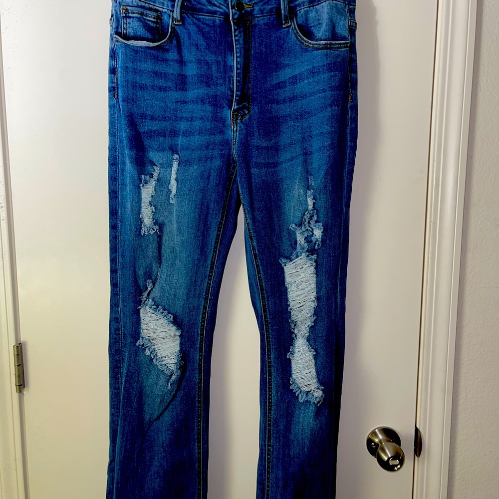 Flare jeans with holes size. 31 fashion nova